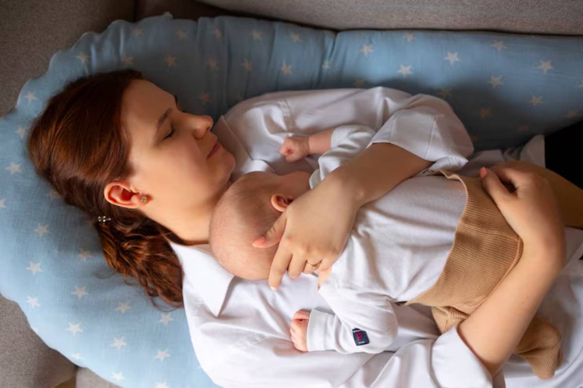 A mother cradles her baby, both swaddled comfortably in soft fabrics, surrounded by a serene, cozy environment.
